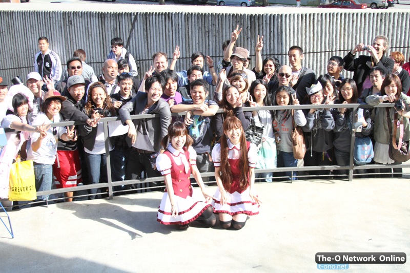 Danceroid with their fans after performing on stage.