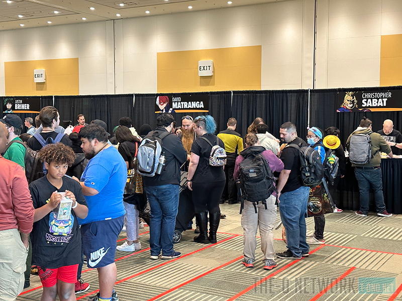 Autograph lines for anime voice actors.